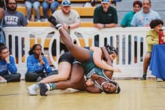 Grace Leota, HHS, championship match pins her opponent from Mckeel. Photo by Cynthia Leota.