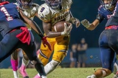 Hernando High running back, John Capel III looks to exploit a hole for yardage against the Springstead defense Friday Night in Spring Hill. Photo by Joe DiCristofalo.