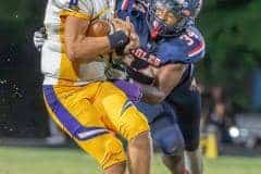 34, D’Narian Washington puts the clamps on Hernando QB, Michael Saltsman in Friday night football action at Springstead High. Photo by Joe DiCristofalo.