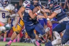 Springstead High, 15, Gio Martinez sprints for yardage against Hernando High during the Homecoming game at Booster Stadium. Photo by Joe DiCristofalo.