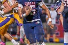 Springstead High, 15, Gio Martinez sprints for yardage against Hernando High during the Homecoming game at Booster Stadium. Photo by Joe DiCristofalo.