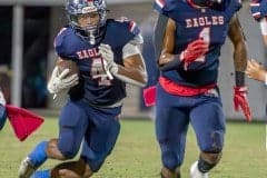 Springstead, 4, Connor McCazzio follows the blocking by, 1, Derrick Chiarella in the 28-13 win Friday over visiting Hernando High. Photo by Joe DiCristofalo.