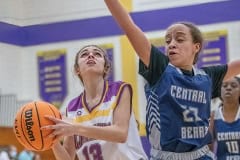 Central High, 23, Qui’mya Thomas defends against Hernando High, 13, Gabrella Dross attempt at a layup shot Friday 1/6/23 at Hernando High. Photo by JOE DiCRISTOFALO