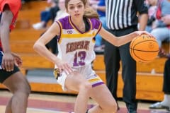 Hernando High, 13, Gabrella Dross looks for a path around Springstead High, 23 J’ziyah Munford Tuesday night 1/3 at Hernando High. Photo by JOE DiCRISTOFALO