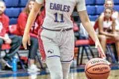 Tuesday night's game against the Seminole Warhawks, Eagle 11 Jr. Samantha Suarez checking out formation of Seminole player for Eagles' next move.   Photo by Cheryl Clanton, 11/22/22.