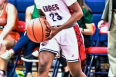 Eagles 23 Fr. J'ziyah Munford walking the ball down the court to setup for the next play against the Warhawks Tuesday night 11/22/22.  Photo by Cheryl Clanton.