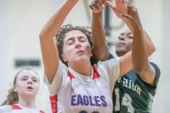 Springstead , 32, Addy Osborne gets fouled by Gulf High’s ,14, Ania Butler  while attempting a shot Wednesday in the Springstead Holiday Tournament. Photo by JOE DiCRISTOFALO