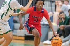 Springstead High, 23, J’ziyah Mumford tries to shake the defense by Weeki Wachee , Rayana Coleman Friday 12/9 at Weeki Wachee High. Photo by JOE DiCRISTOFALO