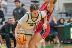 Weeki Wachee High ,23, Linsey Orr drives the baseline around Springstead High ,24, Isabella Paul. Photo by JOE DiCRISTOFALO