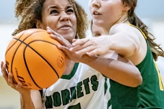 Weeki Wachee High, 5, Arianna Williams gets fouled on the way to the basket in the game against Cypress Creek Wednesday at Weekie Wachee High. Photo by JOE DiCRISTOFALO