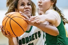 Weeki Wachee High, 5, Arianna Williams gets fouled on the way to the basket in the game against Cypress Creek Wednesday at Weekie Wachee High. Photo by JOE DiCRISTOFALO