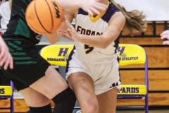 Hernando Leopard Senior #5 Lydia Jackson passing the ball around a Hornet in Tuesday 12/13/22 nights game. Photo by Cheryl Clanton.