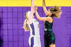 Tuesday 12/13/22 night Weeki Wachee Hornet Senior #5 Joelysee Morales takes a shot while Hernando Leopards Junior #30 Janeried Steinkamp trys to block. Photo by Cheryl Clanton.