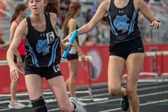 Nature Coast , Addison Cunene and Baileigh Crandell competed in th 4 x 800 relay at the Springstead Eagle Twilight Track Meet Wednesday. Photo by JOE DiCRISTOFALO