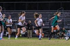 Wednesday night 12/7/22, HHS vs WW Girls Soccer games. Junior Varsity Hornet #7 Hailey Caulkins taking ball down field towards goal. Photo by Cheryl Clanton.