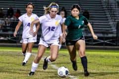 Hernando leopard #12 and Hornets # 4 Lesly Palacios battle to get control of the ball Wednesday night at Weeki Wachee. Photo by Cheryl Clanton.