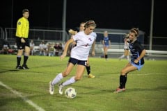 Springstead Lauren Anderson skirts past defender SHS vs NTC 12/14 By Hanna Fox.