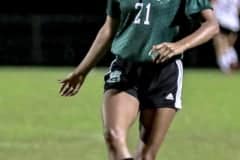 Wednesday night 11/30/22 Hornet #21 warms up before game against Citrus. Photo by Cheryl Clanton.