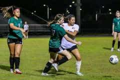 Hornet #17 battles with Citrus to stay in control of the ball on Wednesday November 30, 2022. Photo by Cheryl Clanton.