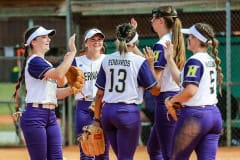 Friday March 31, 2023 Leopards Slam Tournament at Tom Varn Park. Leopards infield players meet on the mound. Photography by Santo.