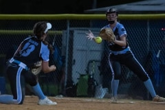 Nature Coast  first base,13, Kassie Figueroa underhands the ball to Haley Keane to record an out against visiting Weeki Wachee Tuesday. Photo by JOE DiCRISTOFALO