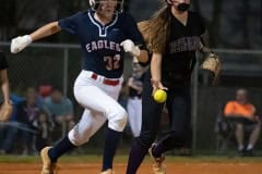 Hernando High, Ava Braswell, throws out Springstead High,32, Rachel Rivera Thursday night in Spring Hill. Photo by JOE DiCRISTOFALO