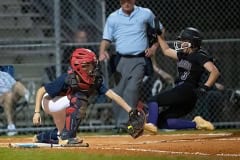 Hernando High ,3, Aryanna Eliopoulos slides into home just ahead of a tag attempt by Springstead catcher, Rachel Rivera Thursday at Springstead High. Photo by JOE DiCRISTOFALO