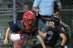 Hernando High ,3, Aryanna Eliopoulos slides into home just ahead of a tag attempt by Springstead catcher, Rachel Rivera Thursday   at Springstead High. Photo by JOE DiCRISTOFALO