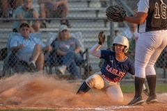 Springstead High’s, 42, Sarah Torres scores a run on a passed ball in the home game with Weeki Wachee High. Photo by JOE DiCRISTOFALO