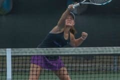 Hernando High's Annabelle Chamberlain stretches for a return while playing the net in the number 2 doubles final match versus Lecanto High during Gulf Coast 8 conference championship held a Delta Woods Park. Photo by JOE DiCRISTOFALO