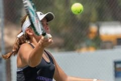 Hernando High's Annabelle Chamberlain concentrates on a return during the  number 2 doubles final match against Lecanto High during Gulf Coast 8 conference championship held a Delta Woods Park. Photo by JOE DiCRISTOFALO