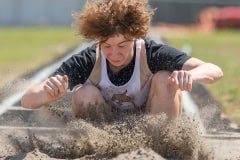 Explorer Middle School , Zander Taylor competes in the long jump. Photo by JOE DiCRISTOFALO