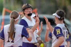 Hernando High’s Ava Braswell gets high fives from her teammates after a strike out versus Citrus High Wednesday, 4/19, at Tom Varn Park. She threw a complete game shut out with nine strikeouts. Photo by JOE DiCRISTOFALO