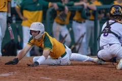 Lecanto runner scores just ahead of the tag attempt by Hernando catcher Drew Bittenger Friday, 4/21/23, in Brooksville.  Photo by JOE DiCRISTOFALO