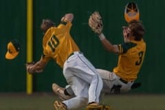 Lecanto High’s Drew Czerwinski and Kamden Aungst collided while catching a pop fly Friday evening, 4/21/23, in the game at Hernando High.  Photo by JOE DiCRISTOFALO.