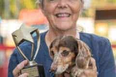 Molly, named Best in Show and her owner Janice VanOss at the Marker 48 “Running of the Wieners. Photo by JOE DiCRISTOFALO.