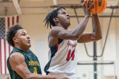 Springstead High's ,14,  Zion Mckenzie drives past Lecanto High’s ,0, Caden Moore for a layup Tuesday at Springstead High. Photo by Joe DiCristofalo