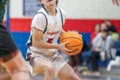 Springstead High's ,5, Ryan Sayre eyes the basket while maneuvering through the defense in Tuesday night’s match against visiting Lecanto High. Photo by Joe DiCristofalo