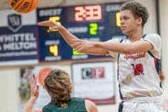 Springstead High's ,12, Austin Nicholson dishes a pass during Tuesday night’s match against visiting Lecanto High. Photo by Joe DiCristofalo