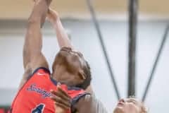 Springstead, 4, Caidell Gilbert goes up for a shot while guarded by Weeki Wachee, 3, Aidan Smith, on Friday 12/9 at Weeki Wachee High School. Photo by JOE DiCRISTOFALO.