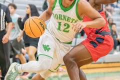 Weeki Wachee, 12, Noah Frazier beats a Springstead defender on his way to the basket Friday 12/9 at Weeki Wachee High School. Photo by JOE DiCRISTOFALO.