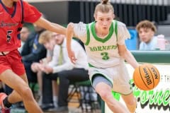 Weeki Wachee,3, Aidan Smith hurries the ball up-court past Springstead, 5, Xylus Pastrana  Friday 12/9 at Weeki Wachee High School. Photo by JOE DiCRISTOFALO.