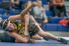 Hernando High, 120 pound Eva Rice , top, took on teammate, Alondra Santana-Perez at the Susan Duval Girls Bash wrestling tournament at Springstead High. Photo by JOE DiCRISTOFALO