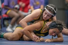 Hernando High, 120 pound Eva Rice , top, took on teammate, Alondra Santana-Perez at the Susan Duval Girls Bash wrestling tournament at Springstead High. Rice won with a pin at 1:31Photo by JOE DiCRISTOFALO