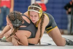 Hernando High Daniela Espinal,top,  took the 125 pound weight class with a pin over Alycia Rivera from Citrus High. Photo by JOE DiCRISTOFALO