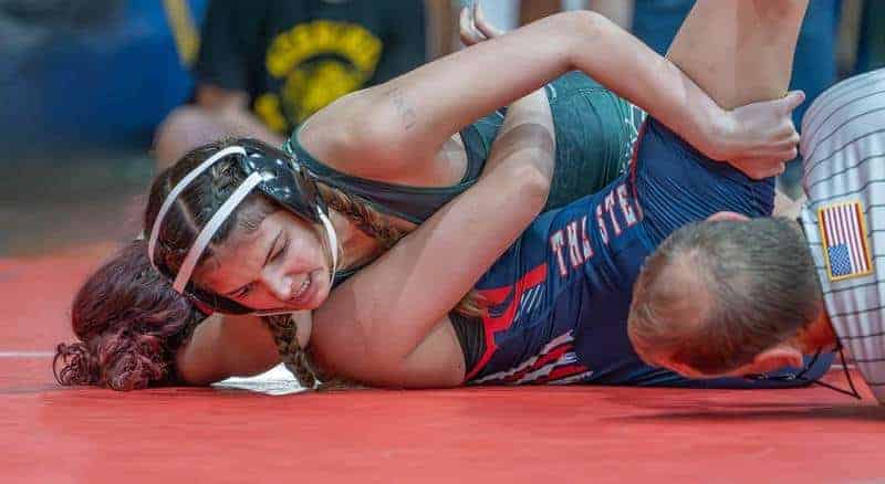 Weeki Wachee High, Savannah Aponte took on Gianna Gabriela Napoli in the 125 pound weight class., Dec. 13, 2023. Photo by Joe DiCristofalo