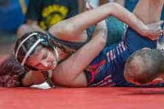 Weeki Wachee High, Savannah Aponte took on Gianna Gabriela Napoli in the 125 pound weight class., Dec. 13, 2023. Photo by Joe DiCristofalo