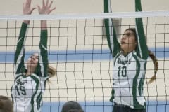 Weeki Wachee ,15, Martina Trenton and, 10, Jadyn Aponte work to put up a block during the 4A district 9 championship match. Photo by JOE DiCRISTOFALO