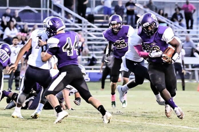 HHS No. 26 Israel Fields and No. 44 David Hale Bronson in play against Central during the 2017 Homecoming game.