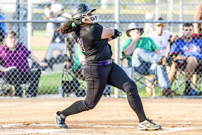 HHS power hitter Janea Mobley takes a swing during the game against Weeki Wachee on April 20, 2018.